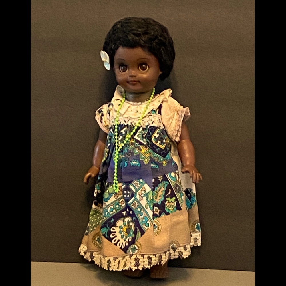 Beautiful African doll with sleepy eyes
